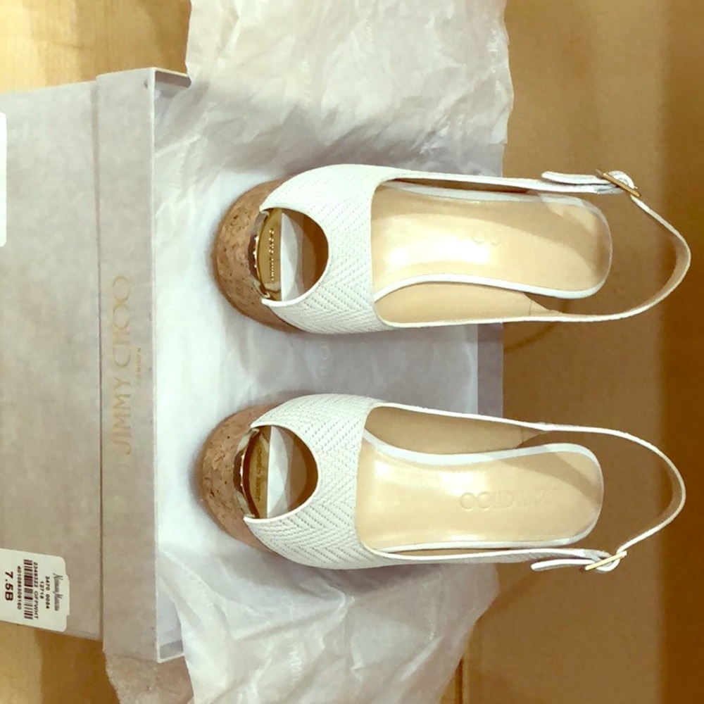Jimmy Choo White 7.5B wedges.